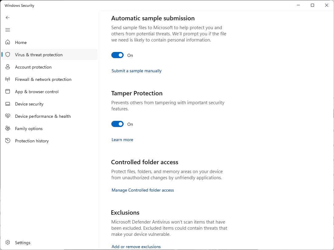 Windows Security en «Virus & threat protection settings» con el apartado Exclusions y el enlace Add or remove exclusions